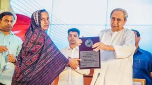 Photo: X/ @CMO_Odisha : Odisha's former CM Naveen Patnaik presenting the Biju Patnaik Sports Award.